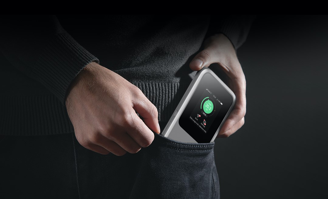 ZTE MU5120 mobile 5G Wi-Fi 6 hotspot in jeans pocket view. Mifi-hotspot.